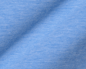 Close-up of The Hatcher Shirt: Horizon Blue & White, featuring light-blue knit fabric with interlocking loops, showcasing its breathable Peruvian Pima cotton and structured spread collar.