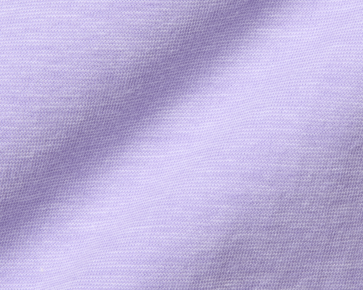 Close-up of The Hatcher Shirt: Tudor & White, showing lavender knit fabric with tiny loops, highlighting its softness, stretch, and structured collar.