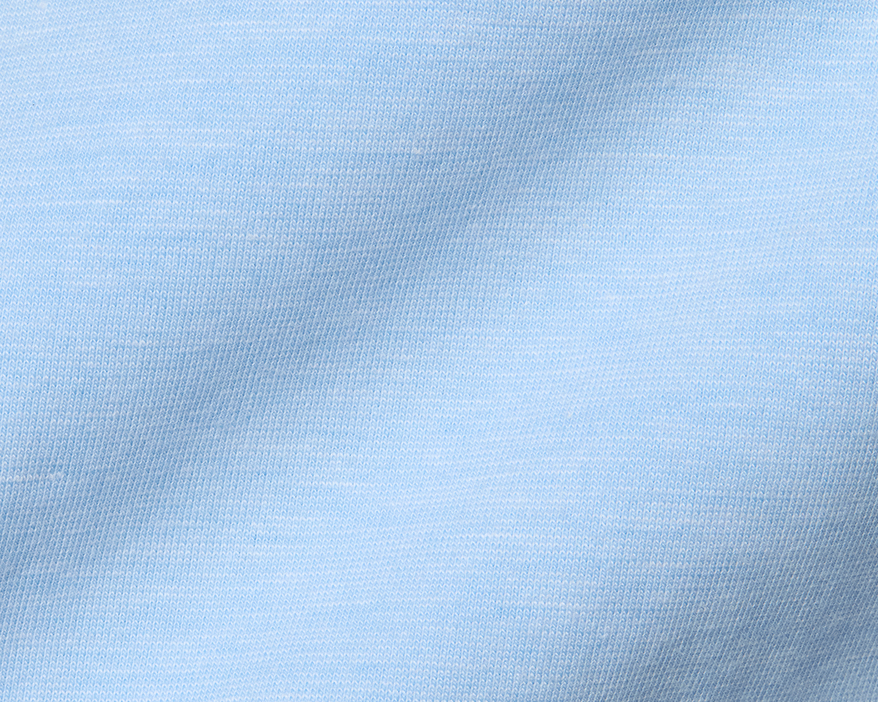 Close-up of The Hatcher Shirt in Vista Blue & White, showcasing fine knit stitches and fabric folds, highlighting its soft, breathable Peruvian Pima cotton blend.
