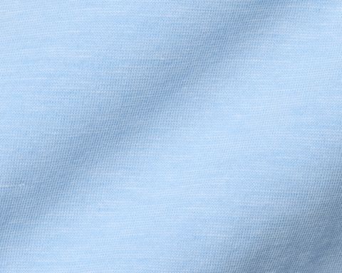Close-up of The Hatcher Shirt in Vista Blue & White, showcasing fine knit stitches and fabric folds, highlighting its soft, breathable Peruvian Pima cotton blend.