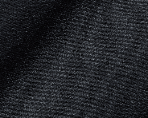 Close-up of The Harwood Short: Black, showcasing its dark, tightly woven fabric with a slight drape, highlighting the soft, stretchable performance material.