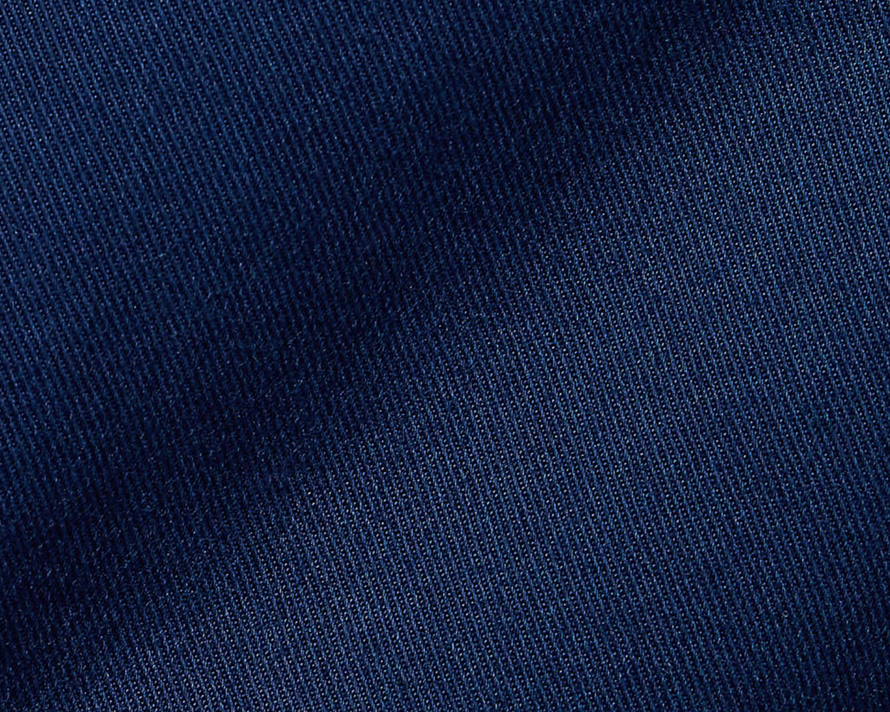 Close-up of The Cameron Short: Navy, showcasing the dark blue woven cotton/stretch twill fabric with a soft, garment-washed texture for comfort and durability.