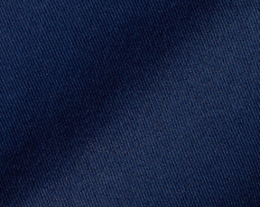 Close-up of The Cameron Short: Navy, showcasing the dark blue woven cotton/stretch twill fabric with a soft, garment-washed texture for comfort and durability.