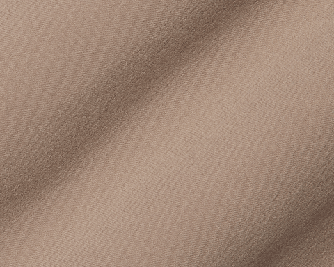 Close-up of The McDaniel 5 Pocket Pant: Fescue, showing its tan-beige woven fabric with fine weave and gentle folds, highlighting its performance and comfort features.