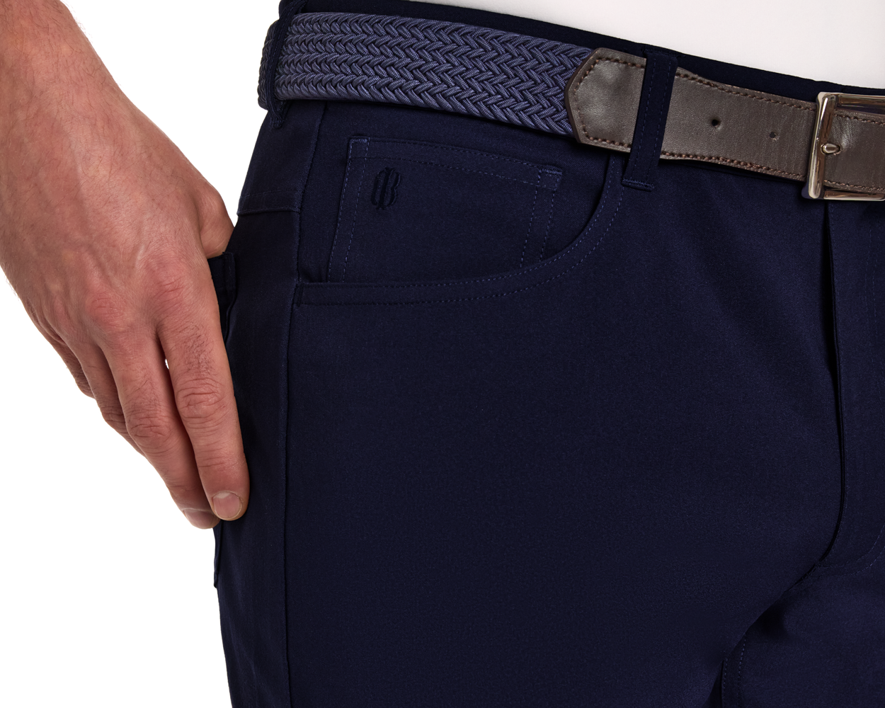 The McDaniel 5 Pocket Pant: Navy, featuring a woven belt with leather accents, visible side and utility pockets, styled with a white shirt.