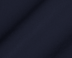The Saunders Short: Navy, showcasing its dark blue woven fabric with a subtle drape, highlighting the fine weave and texture for optimal performance.