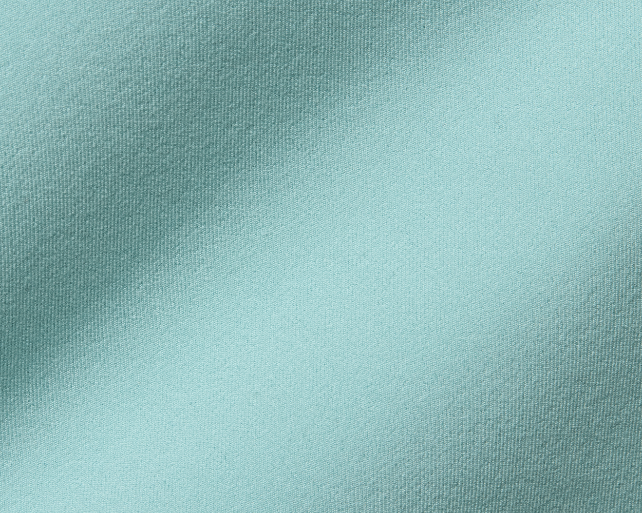 The McDaniel 5 Pocket Pant: Cascade Green, showcasing its light teal fabric with a fine woven texture and gentle folds, highlighting its performance and eco-friendly materials.