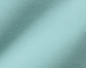The McDaniel 5 Pocket Pant: Cascade Green, showcasing its light teal fabric with a fine woven texture and gentle folds, highlighting its performance and eco-friendly materials.