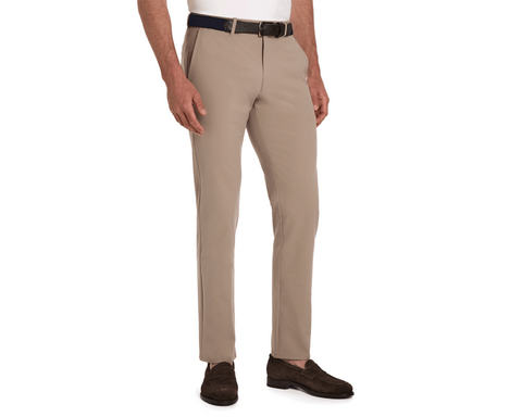 Model wearing The Anson Chino Pant: Fescue, showcasing slim-fit design with classic slant pockets, dark belt, and brown suede loafers.