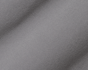 Close-up of The Anson Chino Pant in light gray, showcasing its smooth fabric texture and subtle wrinkles, highlighting its eco-friendly, wrinkle-resistant performance material.