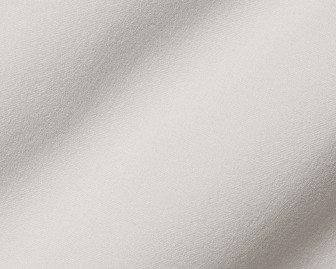 Close-up of The Anson Chino Pant's woven fabric, showcasing fine yarns and subtle texture, highlighting its wrinkle-resistant, quick-drying, eco-friendly, and stretchy performance.