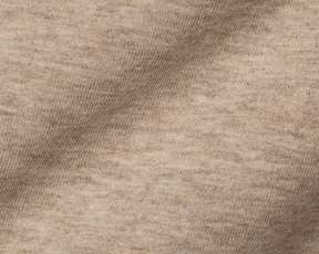 The Lawson Hoodie: Heathered Dune features a close-up of its soft, knitted texture, highlighting the cozy, warm fabric without drawstrings for versatile comfort.