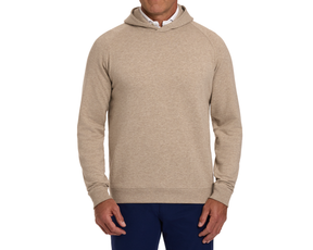 The Lawson Hoodie: Heathered Dune, shown on a man with a white shirt and navy pants, features a soft, drawstring-free hood and a straight hem.