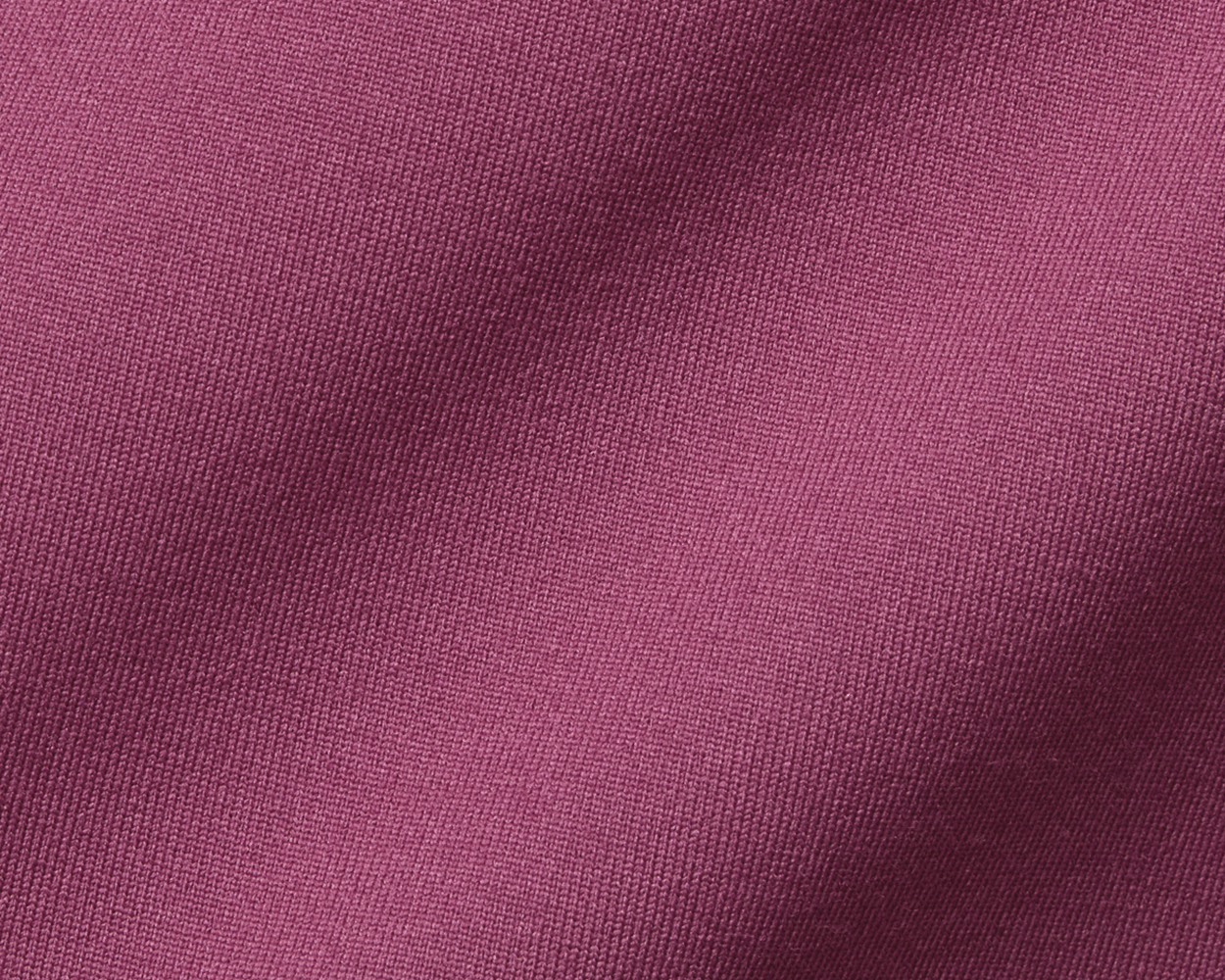 Close-up of The Jackson Hoodie: Cabernet, showcasing its intricate knit texture, reflecting the lightweight, streamlined design ideal for unobstructed golf swings.