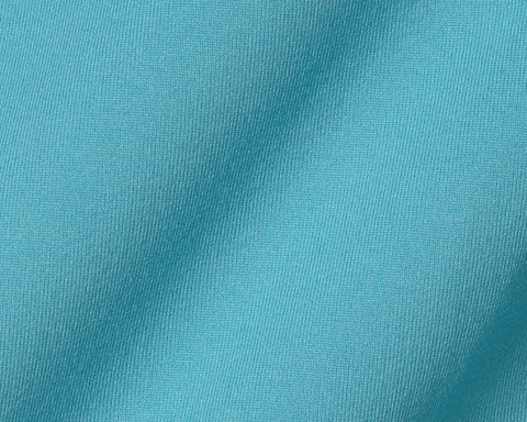 Close-up of The Jackson Hoodie: Harbor, showcasing its fine texture and lightweight knit, tailored for flexibility and comfort during golf swings.