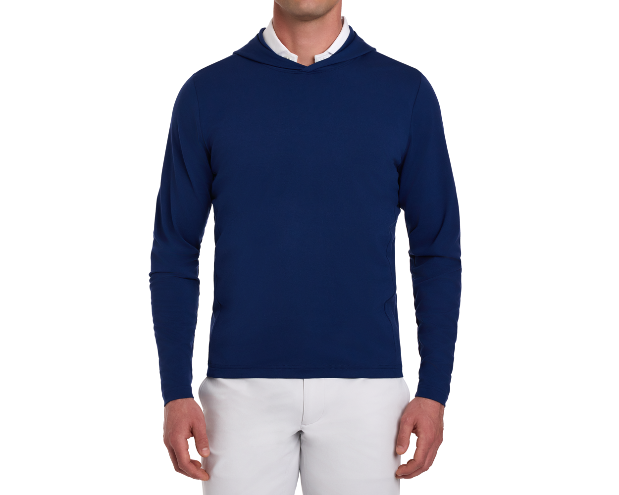 The Jackson Hoodie: Navy, a sleek, long-sleeve pullover layered over a white shirt, paired with light gray trousers, ideal for golf in cooler weather.