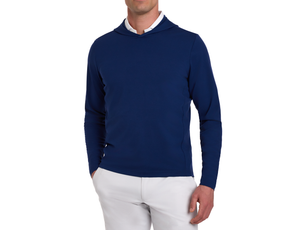 The Jackson Hoodie: Navy, a slim-fit, long-sleeve design over a collared shirt, highlights a minimalist, streamlined style ideal for golf.