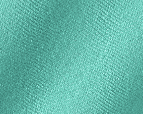 Close-up of The Buckley Crewneck Sweater: Heathered Abaco, showcasing the intricate teal-green knit texture of its 100% Scottish cashmere fabric.