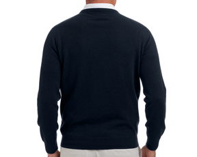 The Buckley Crewneck Sweater: Heathered Dark Navy, shown from the back, layered over a white-collared shirt with beige trousers, highlighting its classic crewneck and durable doubled cuffs.