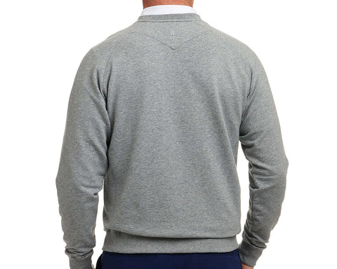 The Kennedy Crewneck in light heather-gray, featuring long sleeves and a plush terry interior, showcased from the back against a plain white background.