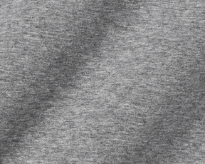 Close-up of The Kennedy Crewneck: Heathered Gray, showcasing its fine jersey knit texture, highlighting the soft, comfortable cotton blend ideal for versatile wear.