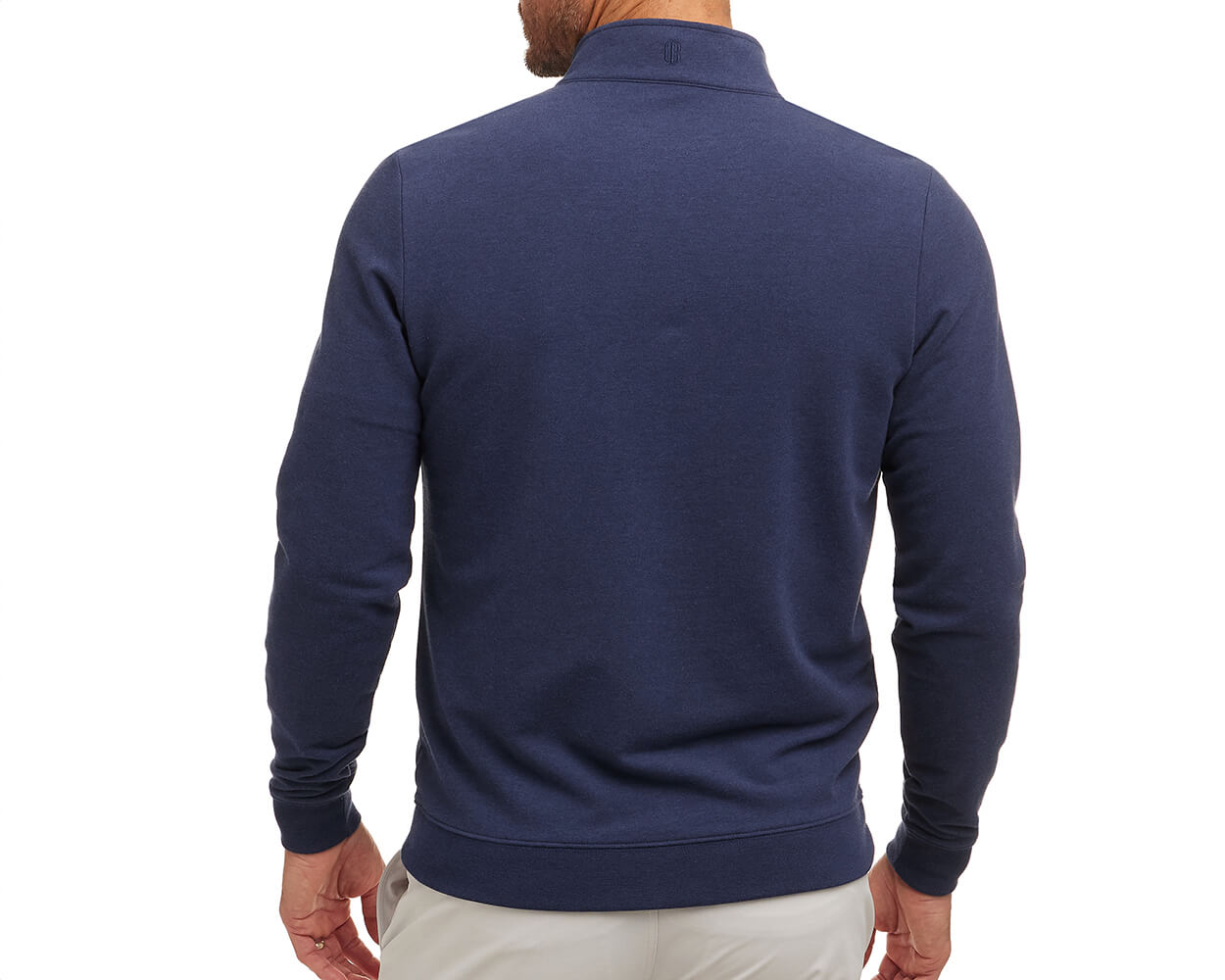 Back view of a man wearing The Harper Quarter-Zip: Heathered Atlantic, showcasing its ribbed cuffs and hem, highlighting the pullover's stylish design and comfortable fit.