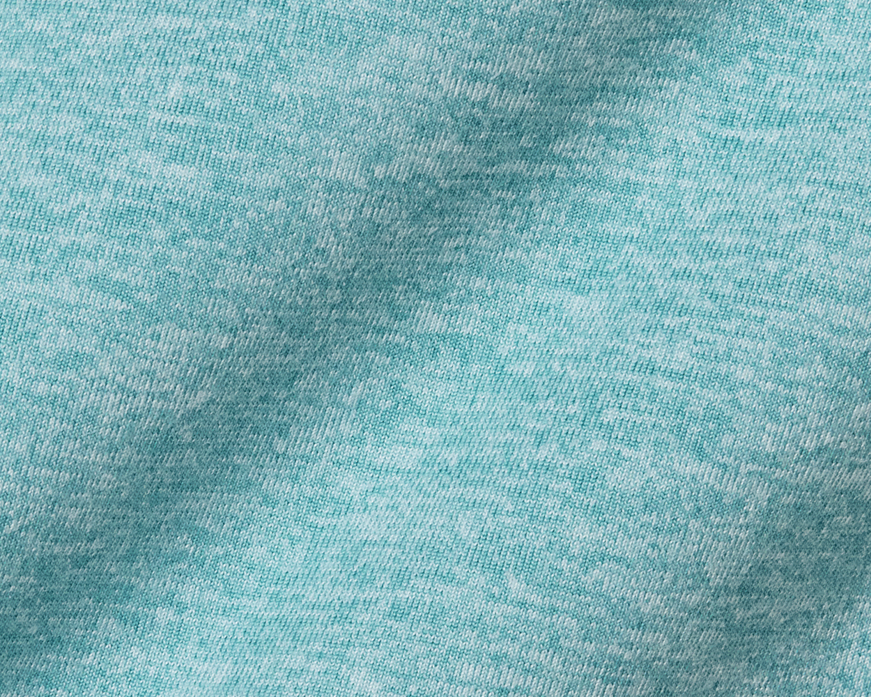 The Stowe Hoodie: Heathered Harbor showcases a close-up of the soft, heathered knit fabric, highlighting its lightweight and performance-ready texture.
