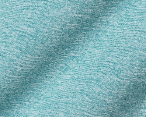 The Stowe Hoodie: Heathered Harbor showcases a close-up of the soft, heathered knit fabric, highlighting its lightweight and performance-ready texture.