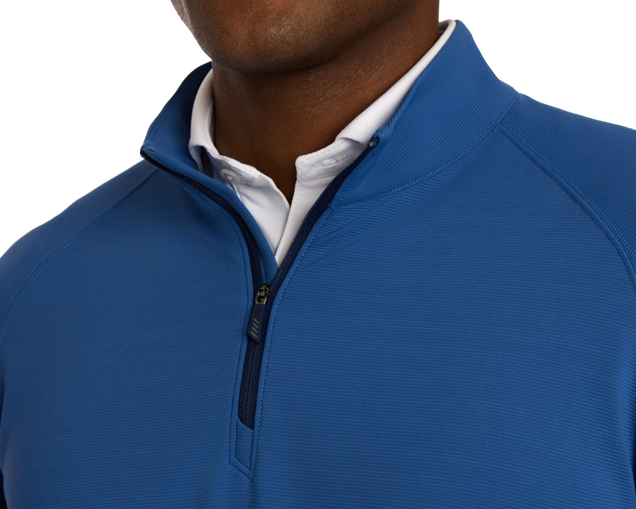 The Stuart Quarter-Zip: Maidstone Blue, showcasing a textured rib fabric and partial zip, worn over a white collared shirt for a modern, versatile look.
