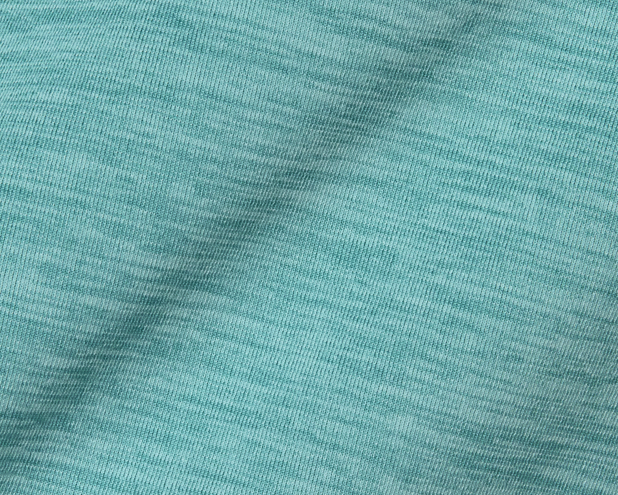 The Laidlay Crewneck: Heathered Harbor, close-up of fine ribbed knit fabric showing its soft, stretchy texture and modern sophistication.