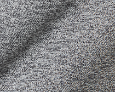 Close-up of The Dunbar Hoodie: Heathered Charcoal, showcasing its soft, breathable knit fabric with visible loops, designed for active wear with advanced UPF 50+ protection.