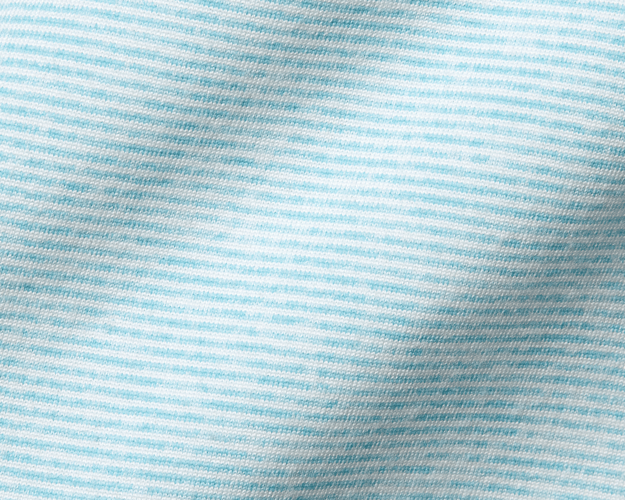 Close-up of The Hamilton Hoodie: Heathered Harbor & White, showcasing its soft, knit fabric with subtle horizontal pinstripes, highlighting the technical hoodie’s comfort and versatility.
