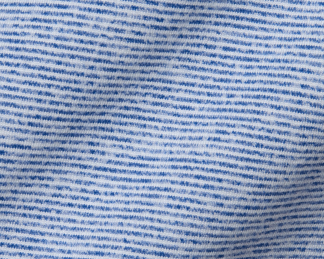 Close-up of The Hamilton Hoodie, showcasing fine blue-and-white stripes on a knitted fabric, highlighting its lightweight, ultra-soft performance blend with 4-way stretch.