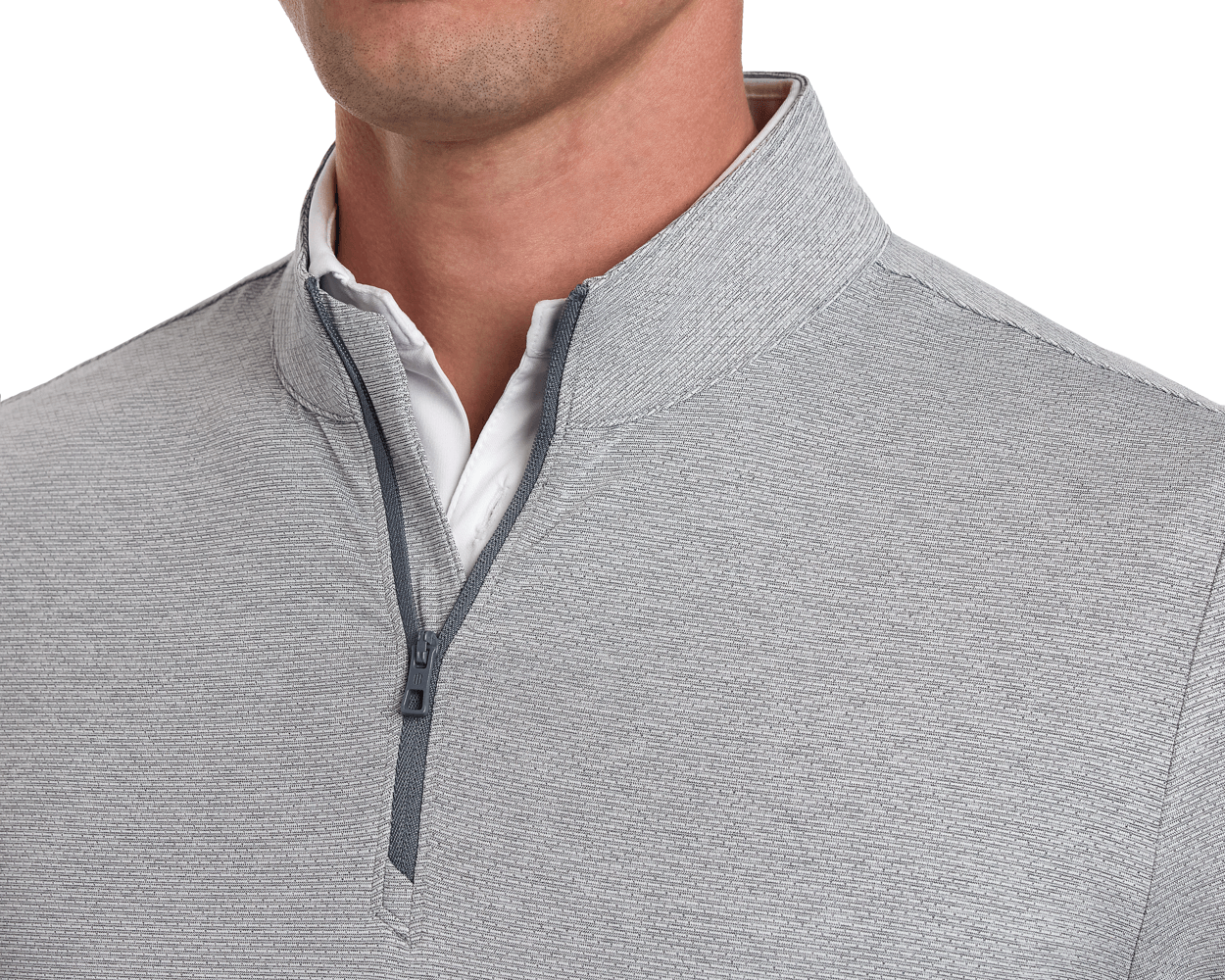 Man wearing The Bell Quarter-Zip: Heathered Gray, featuring a light gray texture, standing collar, and darker gray zipper accents over a white collared shirt.