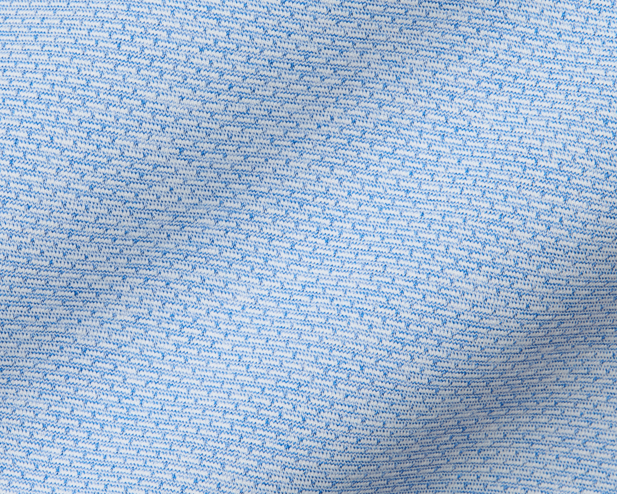 Close-up of The Bell Quarter-Zip: Heathered Vista Blue, showing intricate white and blue yarn stitches that create a textured, sporty, and sophisticated fabric.