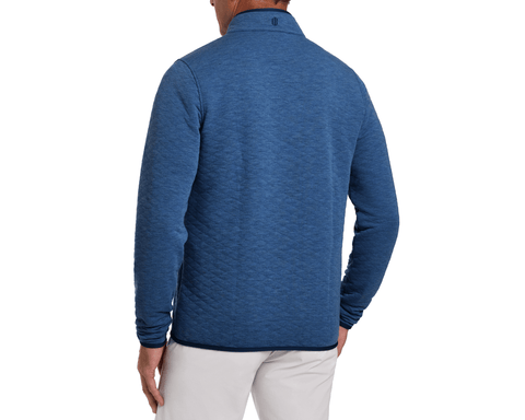 The Sullivan Quarter-Snap: Heathered Maidstone Blue, featuring a quilt-textured back and contrasting trim, showcasing its soft fabric and warm, stylish fit.