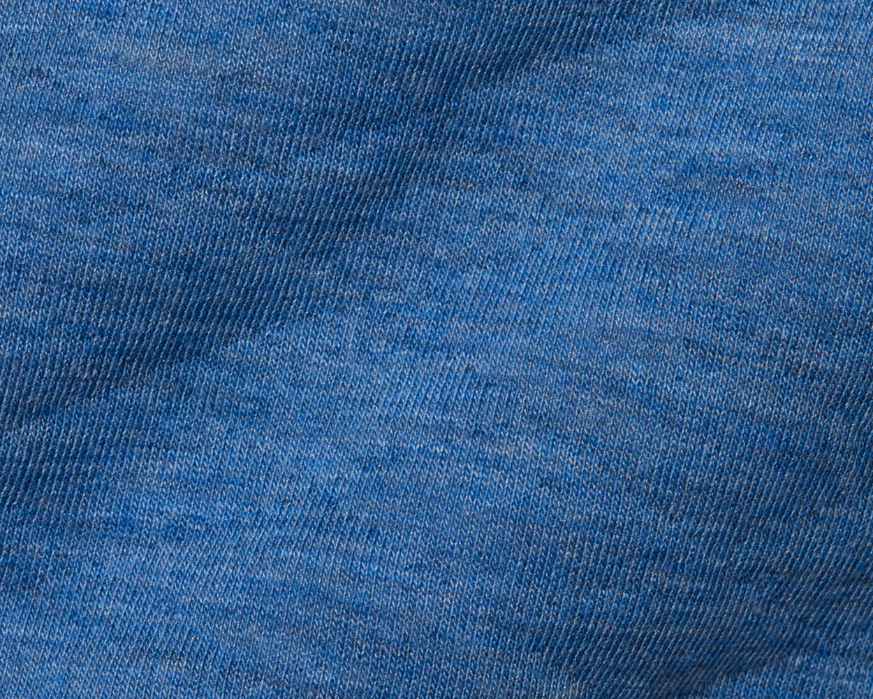 The Sullivan Quarter-Snap: Heathered Maidstone Blue pullover, showcasing soft blue knit fabric with diamond-quilted insulation and contrasting trim for casual style and warmth.