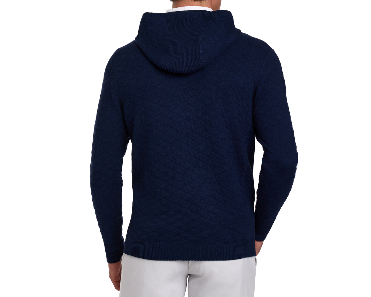 Back view of Yale Golf Course Wallace Sweater in heathered navy, showcasing its diamond-quilted texture and hood down, paired with light-colored pants.