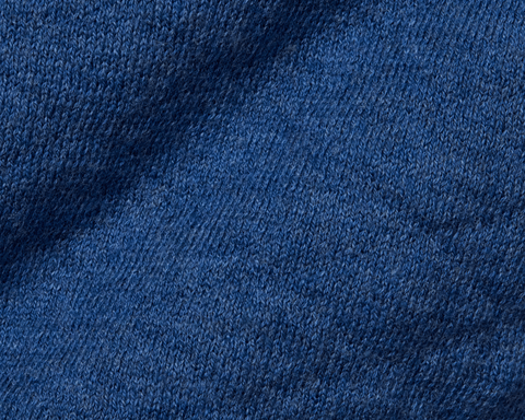 The Wallace Boys Hoodie Sweater: Heathered Maidstone Blue showcases a close-up of its jacquard-knit pattern, highlighting detailed loops and ribbed side panels.