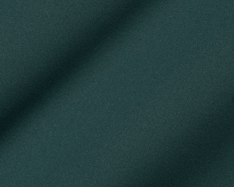 Close-up of The Rodgers Quarter-Zip: Cypress fabric showing its fine diagonal woven texture in a deep green, from a stretchy midweight knit.