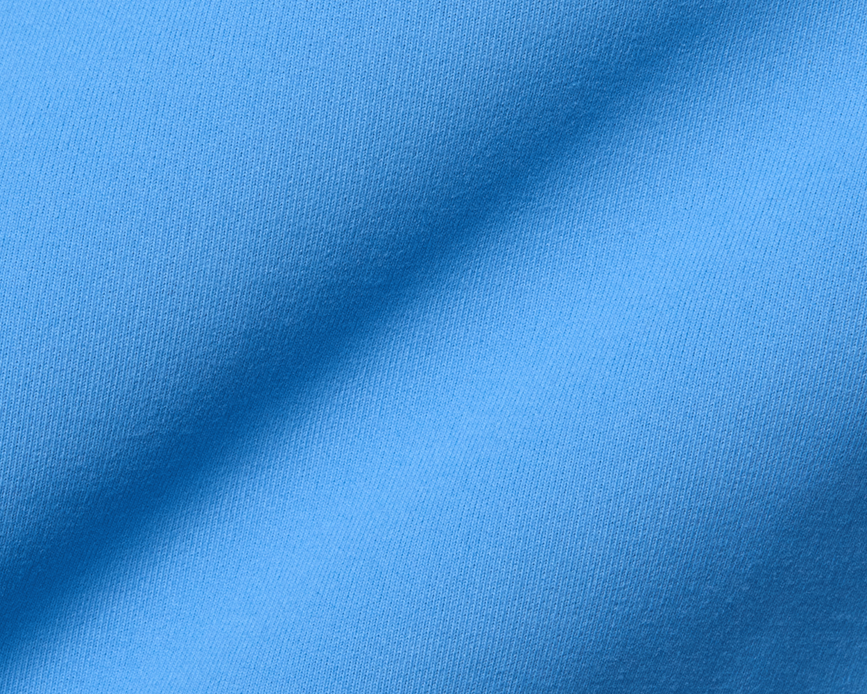 Close-up of The Rodgers Quarter-Zip in Horizon Blue, showcasing its textured, stretchy knit fabric, ideal for comfort and sun protection during outdoor activities.
