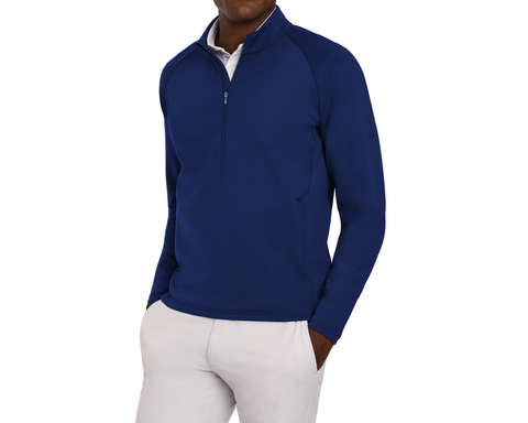 Person wearing The Rodgers Quarter-Zip: Navy over a white shirt, hands in pockets of light-gray pants, highlighting its casual, versatile style.