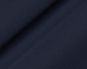 The Boyd Vest: Navy, shown in close-up, highlighting its fine weave and diagonal drape, epitomizes windproof, water-resistant performance with lightweight, four-way stretch fabric.