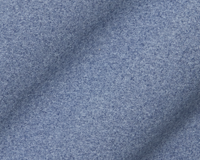 The Westland Quarter-Zip: Heathered Andover, showcasing detailed blue knit fabric with tiny loops, highlighting its soft, moisture-wicking peached synthetic blend.