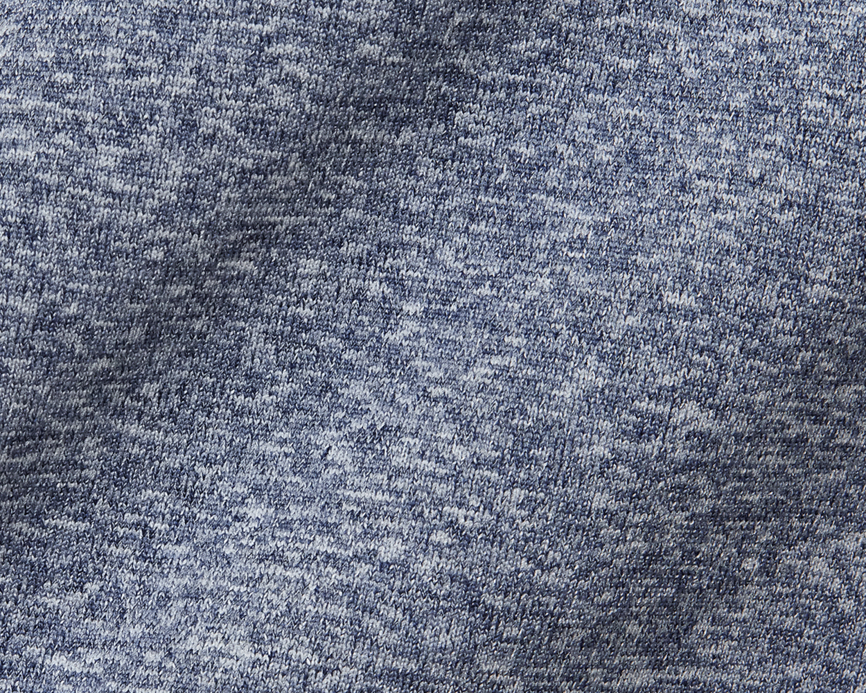The Carr T-Shirt: Heathered Navy features textured, looped yarn in a macro shot, highlighting its seamless knitting and breathable AIRATION® fabric.