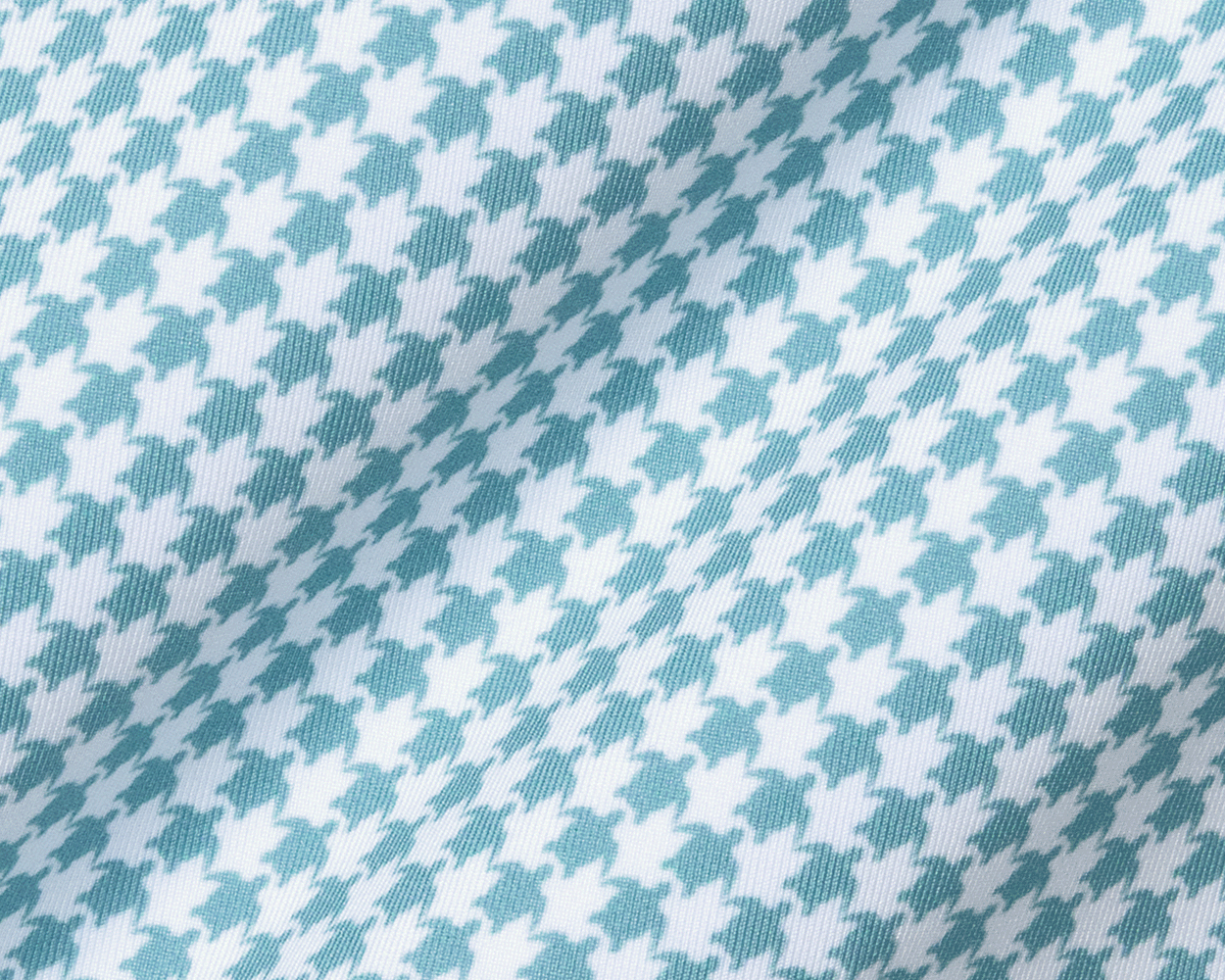 Close-up of The Kitts Boys Shirt: Harbor, showcasing a turtle print in a houndstooth pattern on soft, breathable DryLuxe jersey fabric with structured collar.
