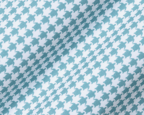 Close-up of The Kitts Boys Shirt: Harbor, showcasing a turtle print in a houndstooth pattern on soft, breathable DryLuxe jersey fabric with structured collar.