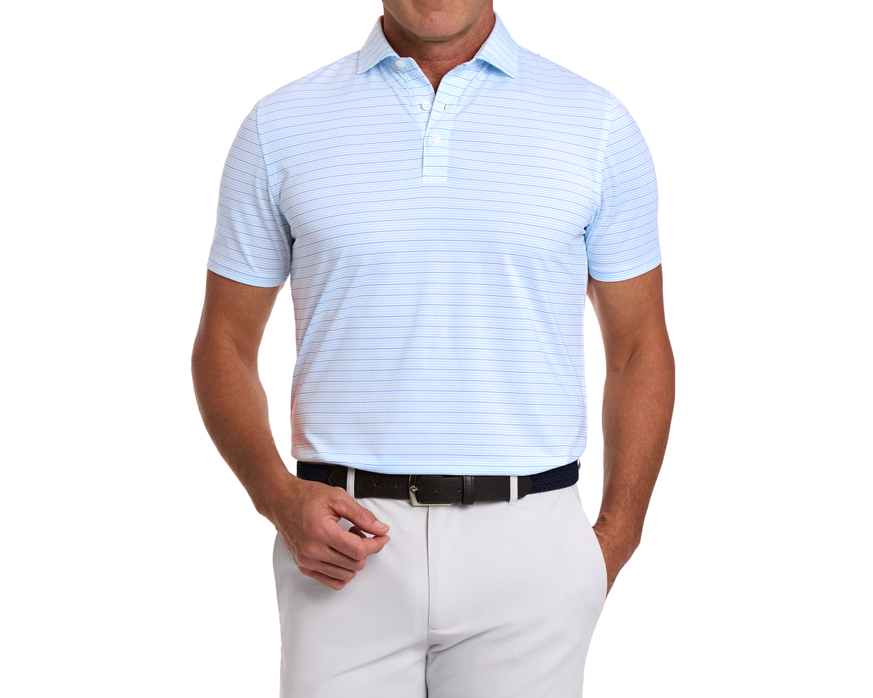 Man wearing The Stanley Shirt in light-blue with fine stripes, tucked into light trousers with a dark belt, showcasing breathable, moisture-wicking fabric.