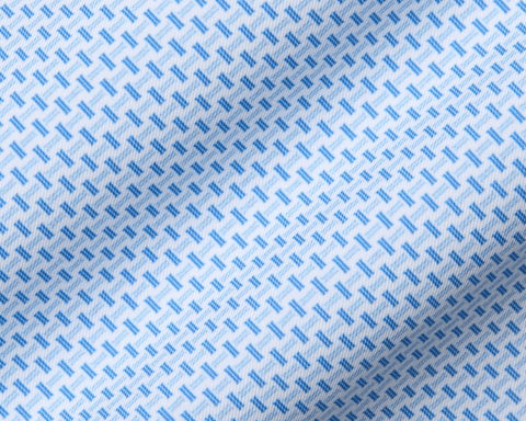 Close-up of The Norman Shirt with a geometric basketweave pattern, showcasing its texture and design details, emphasizing performance fabric and structured collar.