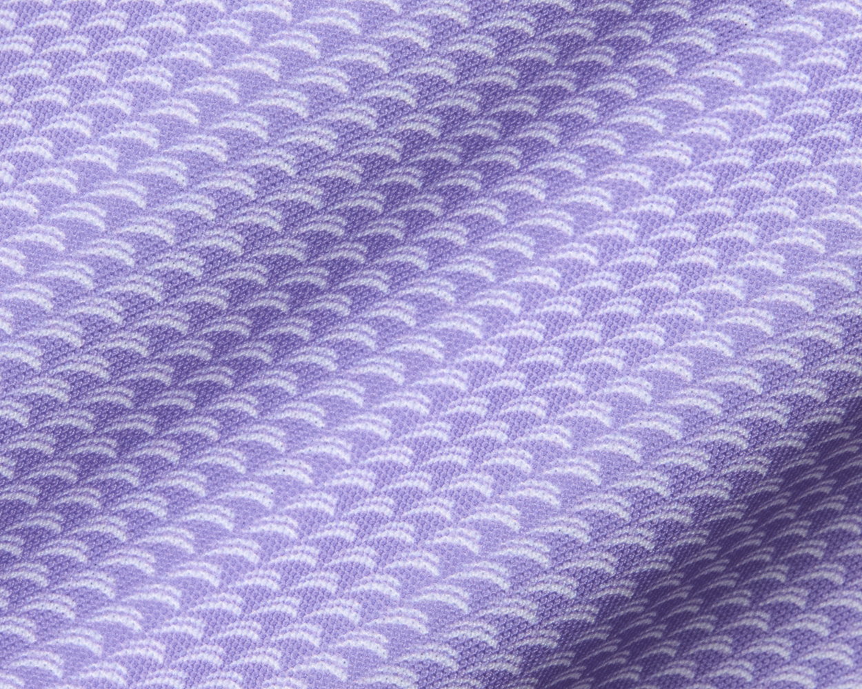 The Eaton Shirt: Tudor features a lavender knit fabric with a textured abstract wave pattern, offering moisture-wicking and UPF 30+ protection.